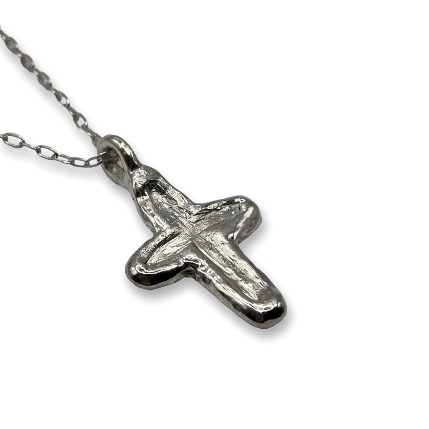 SCRATCHED SILVER CROSS